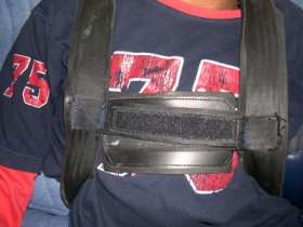 Straps for the chest can prevent the patient from flinging or falling out of the wheelchair, or banging his head forward or backward.